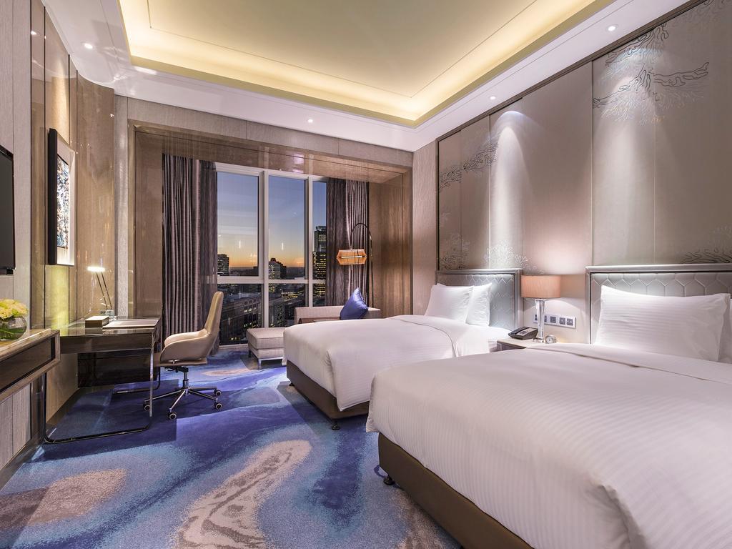 Pullman Yantai Center Hotell Exteriör bild