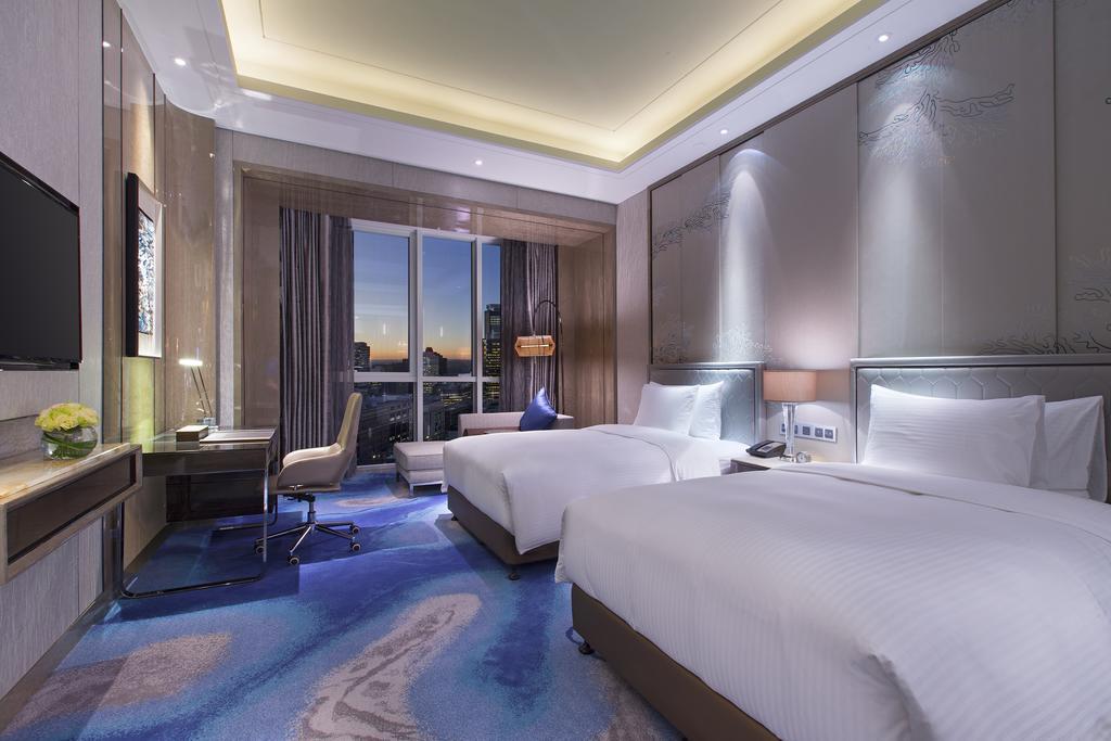 Pullman Yantai Center Hotell Rum bild